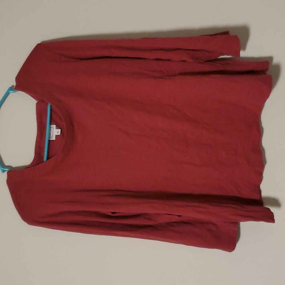 Red Habitat long sleeve tee.